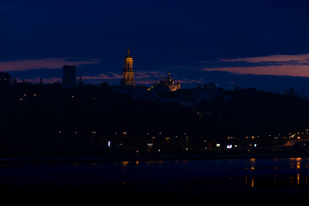 Lavra bell tower and Lavra orthodox church and monastery in night lights. Kiev, Ukraineの写真素材