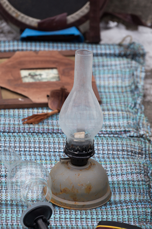 Old vintage kerosene lamp at flea market in Kievの写真素材