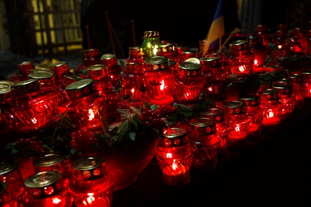 Red candles at night near the holodomor memorial in Ukraine. Famineの写真素材