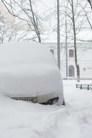 Car into snow. Car parked near home parked into snow.の写真素材