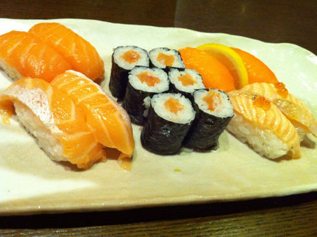 A platter of assorted salmon sushiの素材