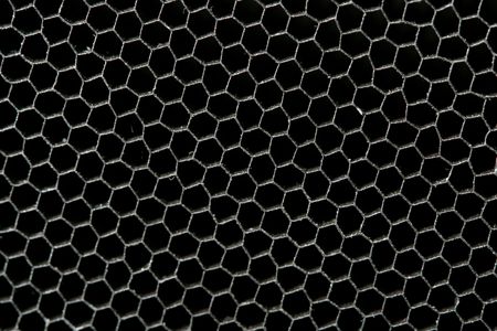 abstract background black cells like latticeの写真素材