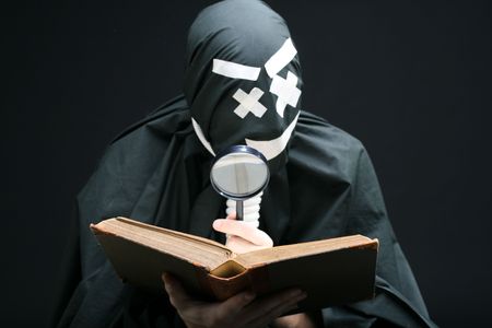 black mime portrait white eyes rope on neckの写真素材