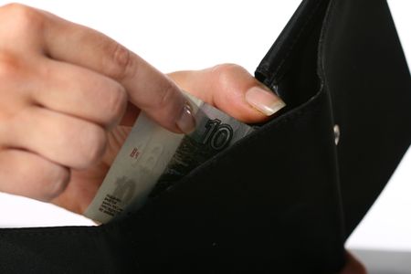 girl hand hold money in purse
