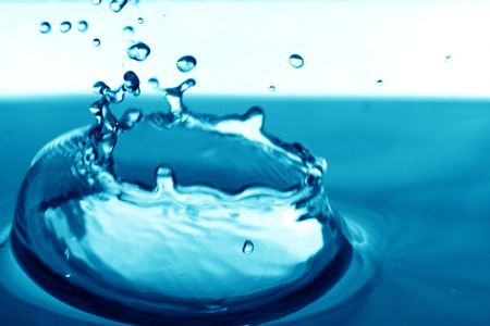 blue water splash macro close upの写真素材