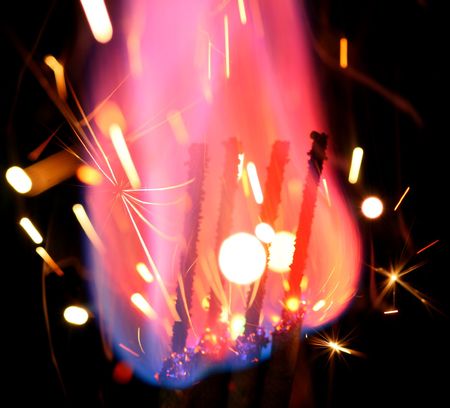 holiday flame on black backgroundの写真素材