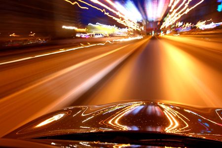 speed drive on car at night motion blurredの写真素材