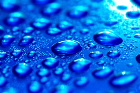 clean blue waterdrops macro backgroundの写真素材