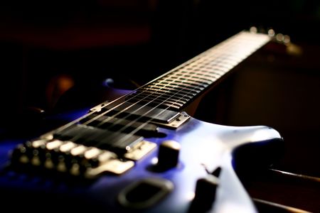 guitar head strings macro on blackの写真素材