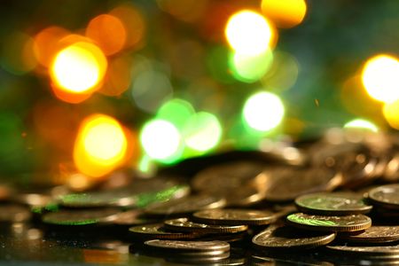 coins and colored  bokeh on background