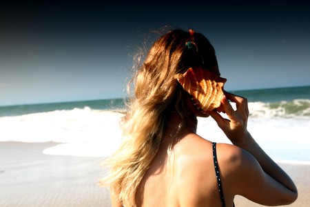 pretty girl call by shell phoneの写真素材