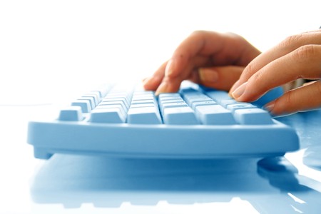 girl hands typing on keyboard macro close upの写真素材