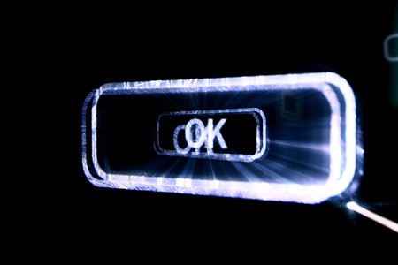 abstract ok button in darkの写真素材
