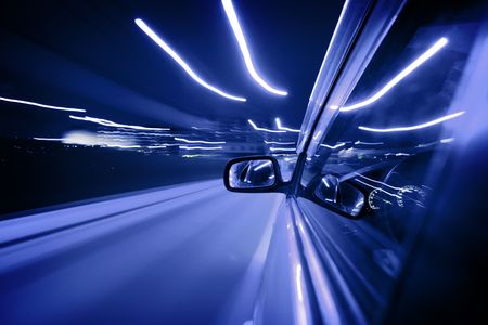 car fast drive on highway in nightの写真素材
