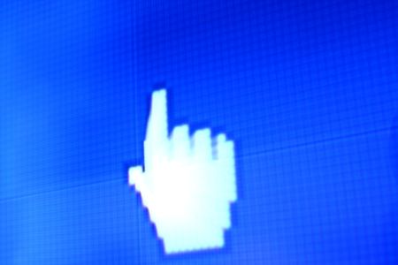 finger corsor on blue pixel screenの写真素材