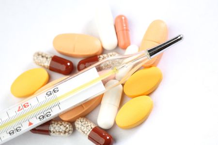 thermometer and drugs medical background