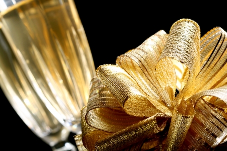 holiday card golden champagne and giftの写真素材