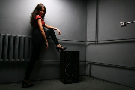 beautiful girl portrait against a wallの写真素材