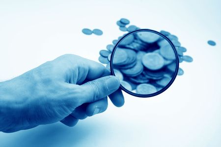 magnifier in men hand isolatedの写真素材