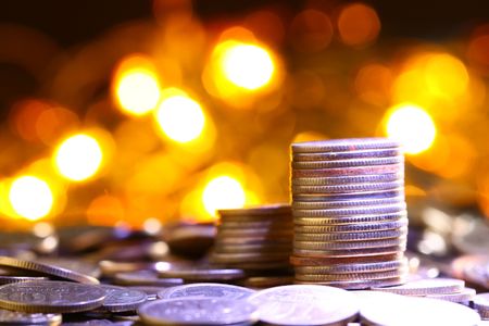 magic coins on bokeh backgroundの写真素材