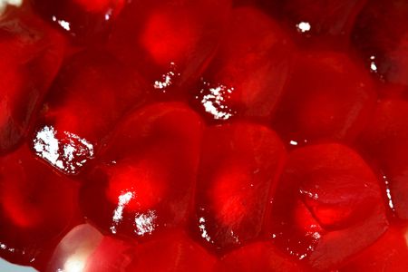 pomegranate macro close up on white background