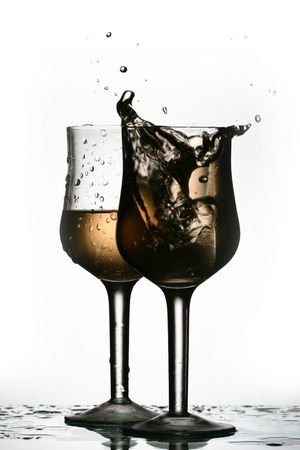 wine splash isolated on whiteの写真素材