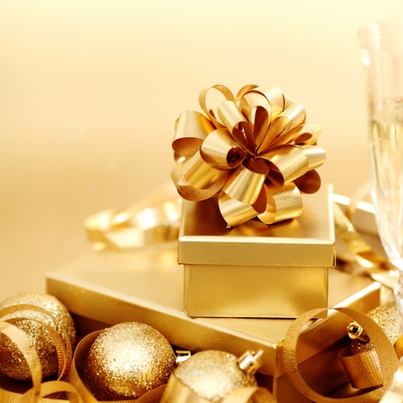 golden christmas background champagne gifts ballの写真素材