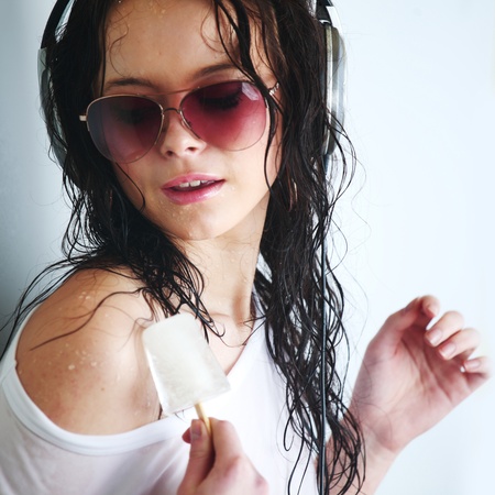 happy woman dance in phonesの写真素材