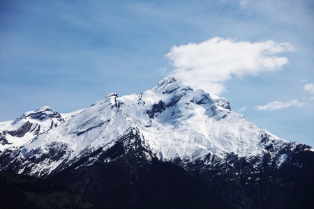 top of mountains sun in blue skyの写真素材