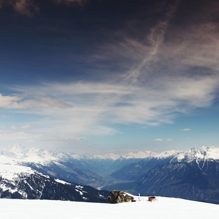 top of mountains in blue sky