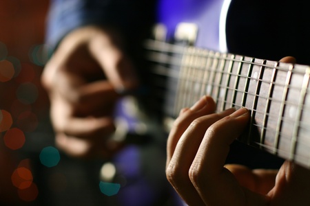 man play solo on blue guitar
