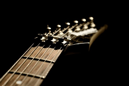 guitar head strings macro on blackの写真素材