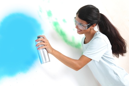 woman paints the wall of balonの写真素材