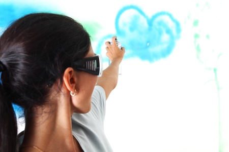 woman paints the wall of balonの写真素材