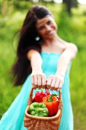 woman give paprica to youの写真素材