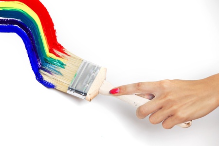 rainbow paint on the white wallの写真素材