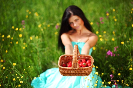 sweet strawberry in woman handsの写真素材