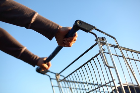 take cart in hands go shopingの写真素材
