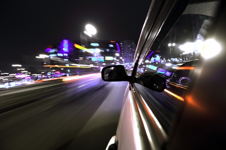 car fast drive on highway in nightの写真素材