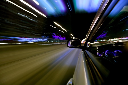 car fast drive on highway in nightの写真素材
