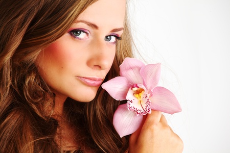 orchid woman flower in hairsの写真素材