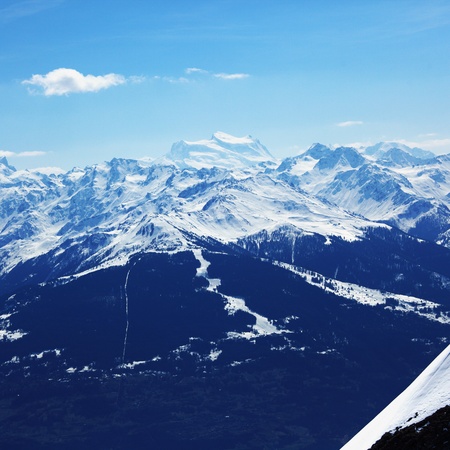 top of mountains in blue skyの写真素材