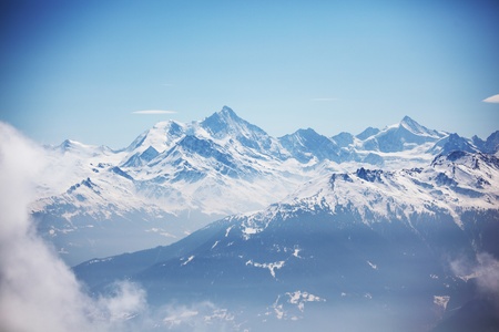 top of mountains in blue skyの写真素材