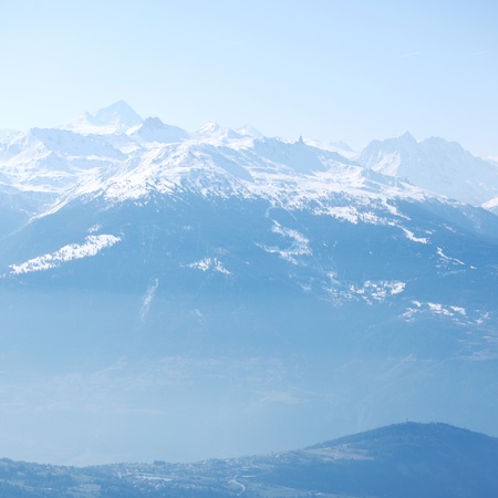 top of mountains sun in blue skyの写真素材