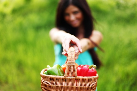 woman give paprica to youの写真素材