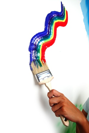 rainbow paint on the white wallの写真素材