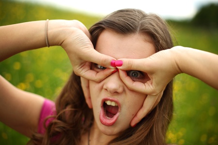 woman on flower field close portraitの写真素材
