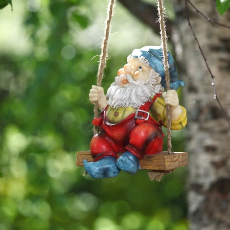 garden dwarf on green nature background