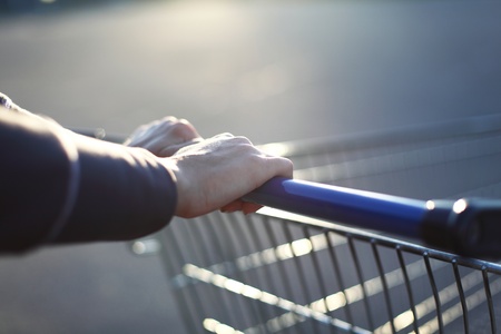 take cart in hands go shopingの写真素材