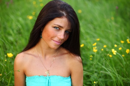 beautiful woman on flower fieldの写真素材